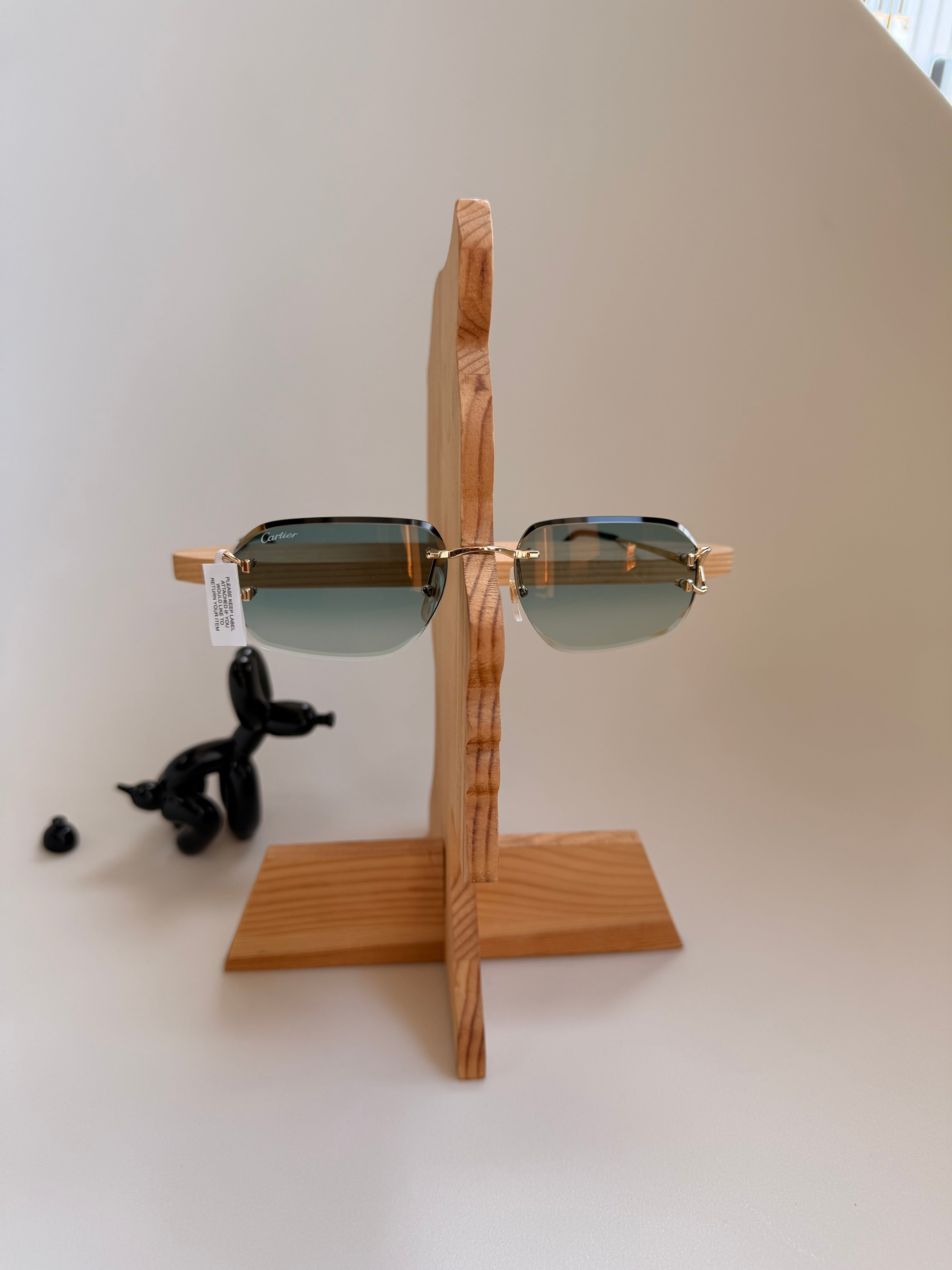 Cartier Eyewear rimless rectangle-frame sunglasses